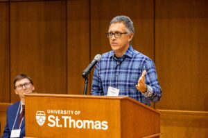 a speaker at a podium