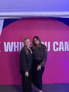 Two female students posting for a picture at the MN AdFed award ceremony