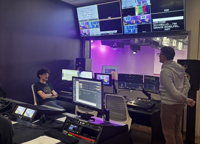 Dr. Peter Gregg checks on show graphics with Kevin Lynch just before airtime, May 4, 2026.