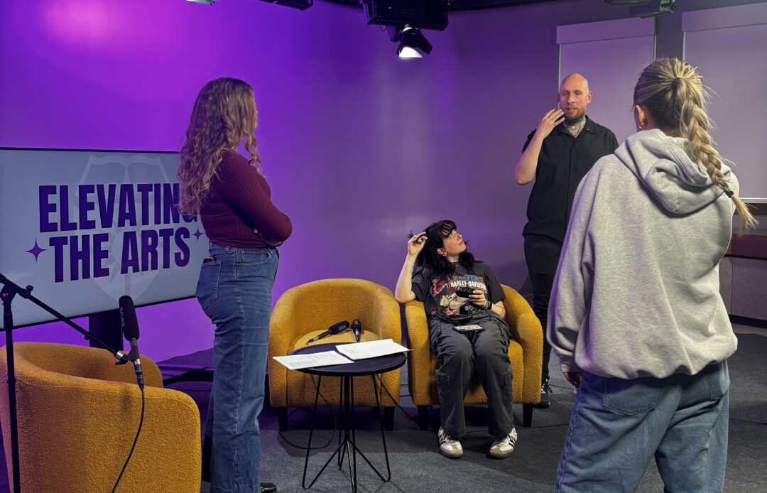 students and a faculty in the eMedia studio
