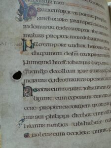 small hole on the text page of book of Kells