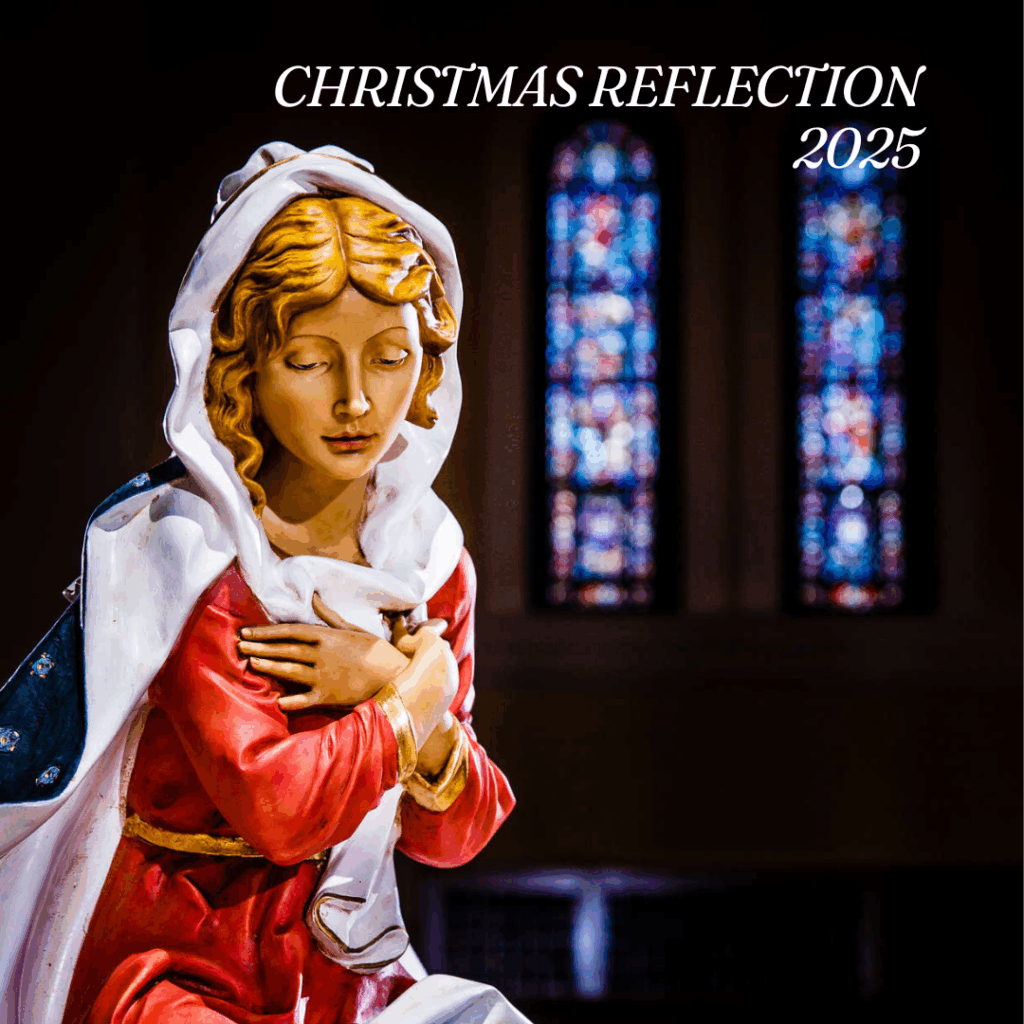 A close-up of Mary from the Nativity scene, shown with folded arms and a gentle, prayerful expression. Stained-glass windows glow behind her. Text reads “Christmas Reflection 2025.”